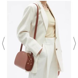 APC half-moon shoulder bag (Demi Lune) in Smooth Calf Leather in Rosa color